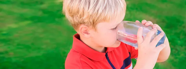 Cute Young Caucasian Boy Drinking Clear Fresh Mineral Water Outdoors — Stock Photo, Image