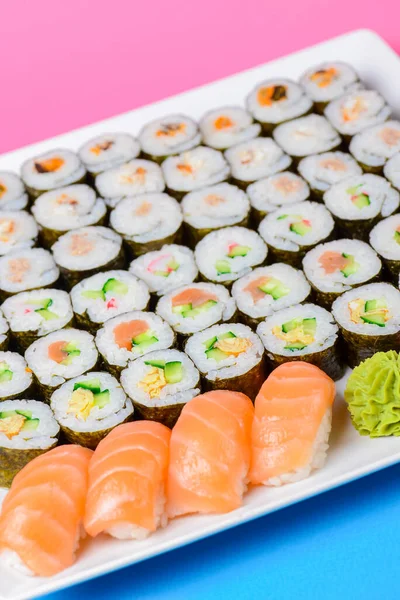 Sushi Large Set Served White Plate Pink Background Traditional Asian — Stock Photo, Image