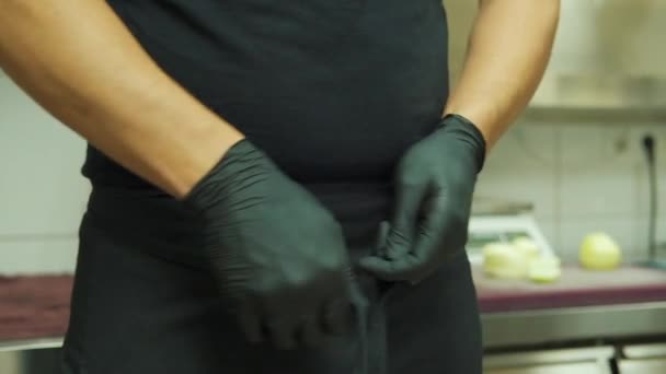 Young Stylish Chef Getting Ready Work Guy Puts Black Apron — Video Stock