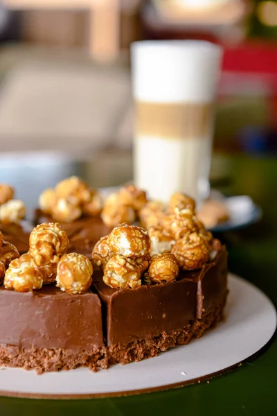 Chocolate Cake Cream Cheese Glaze Caramel Pop Corn Topping Served — Stock Photo, Image