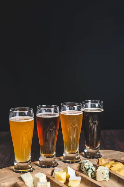 Different Kinds Cold Beer Rustic Wooden Table Black Background Lager — Stock Photo, Image