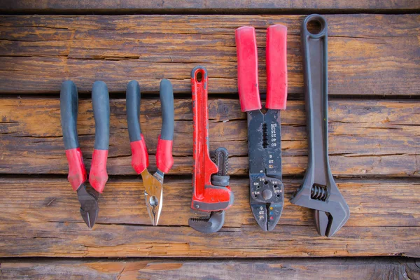 Construction tools on a wooden background — Stock Photo, Image