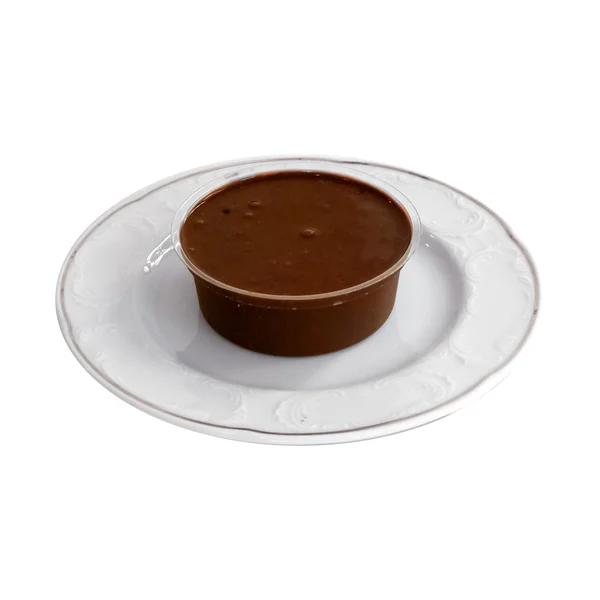 Pudim de sobremesa de chocolate de perto, isolado em branco — Fotografia de Stock