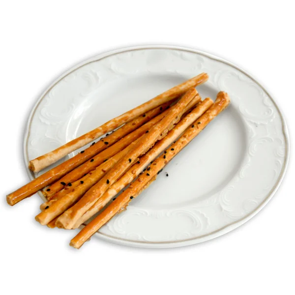 Deliciosos palitos crujientes aperitivo de hojaldre con semillas de sésamo —  Fotos de Stock