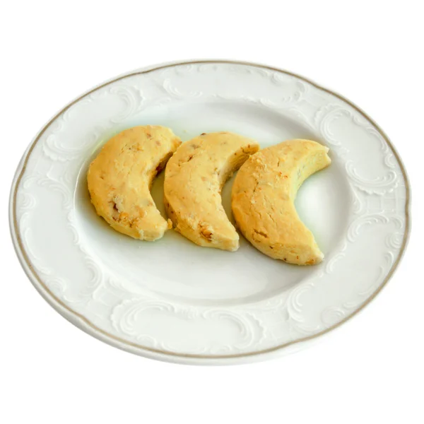Ζαχαροπλαστείο νόστιμα μπισκότα σε ένα άσπρο πιάτο — Φωτογραφία Αρχείου