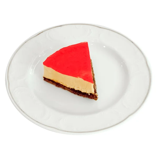 Stuk van frambozen cheesecake op een witte plaat — Stockfoto