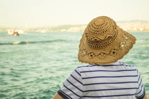 Young Woman Watching the Sea