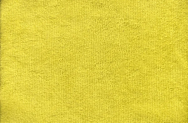 Synthetischer gelber Stoff aus nächster Nähe — Stockfoto