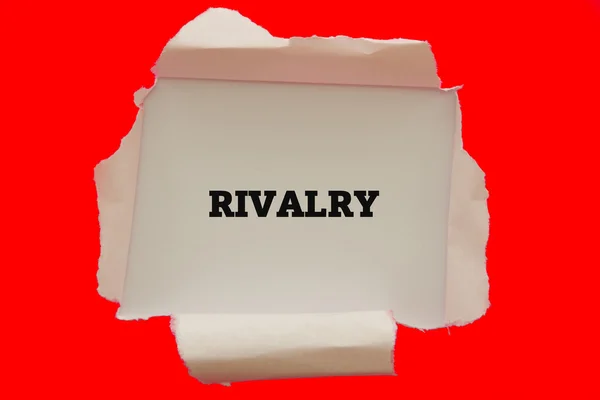 Надпись Rivalry Внутри Дыры Картонке — стоковое фото