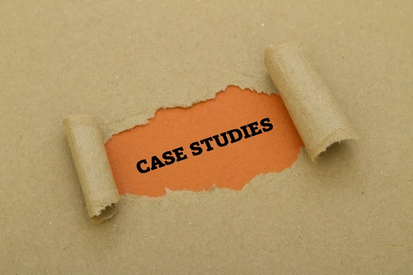 CASE STUDIES inscription inside of hole in cardboard