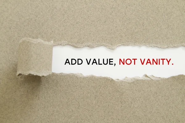 add value, not vanity inscription inside of hole in cardboard