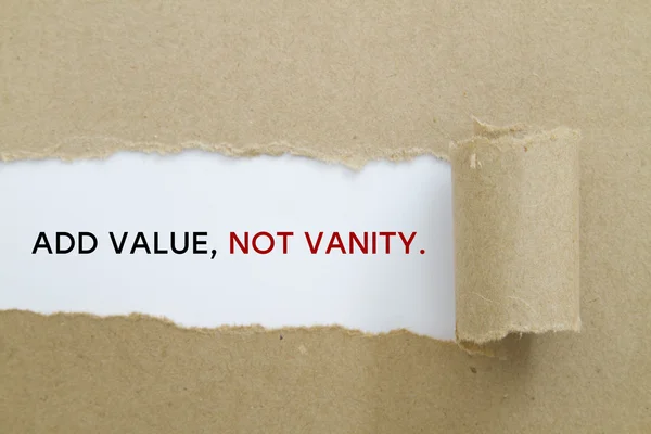 add value, not vanity inscription inside of hole in cardboard