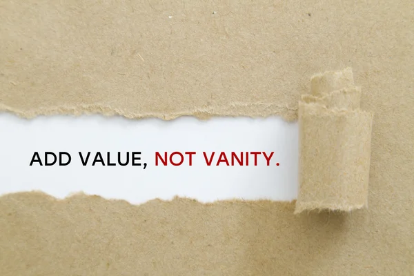 add value, not vanity inscription inside of hole in cardboard