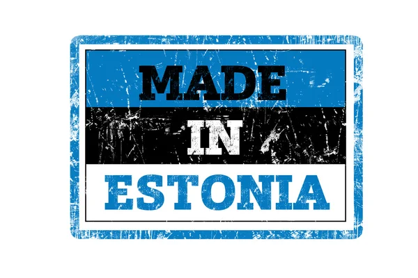 HECHO EN ESTONIA palabra escrita en sello de goma roja y bandera con bordes grunge . — Foto de Stock