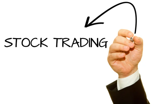 Hand schrijven Stock Trading op een transparante wipe board. — Stockfoto