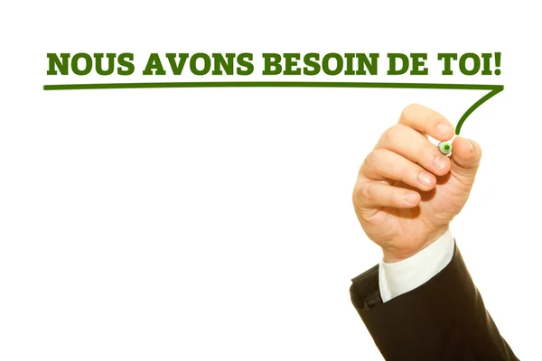 Escrita à mão francês Slogan NOUS AVONS BESOIN DE TOI! (Precisamos de você!) em uma placa de limpeza transparente . — Fotografia de Stock