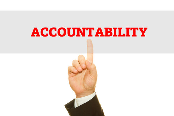 cropped shot of businessman writing accountability inscription isolated on white