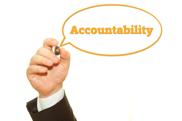 cropped shot of businessman writing accountability inscription isolated on white