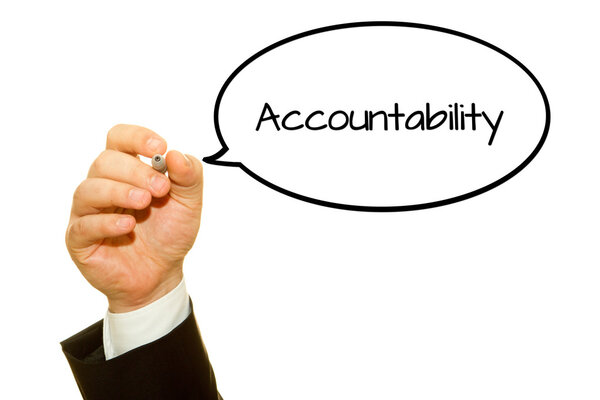 cropped shot of businessman writing accountability inscription isolated on white
