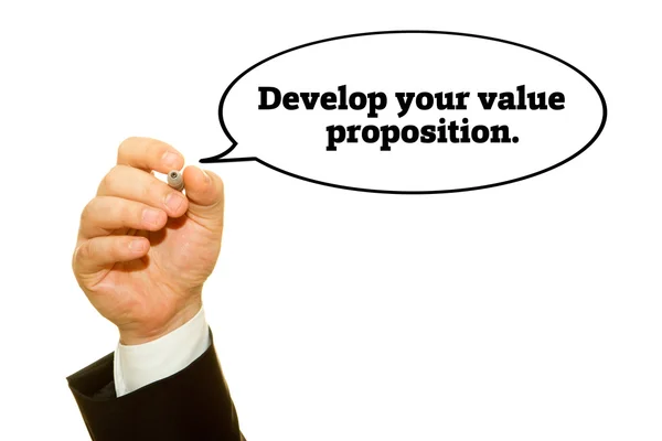 Cropped Shot Businessman Writing Develop Your Value Proposition Inscription Isolated — Stock Photo, Image