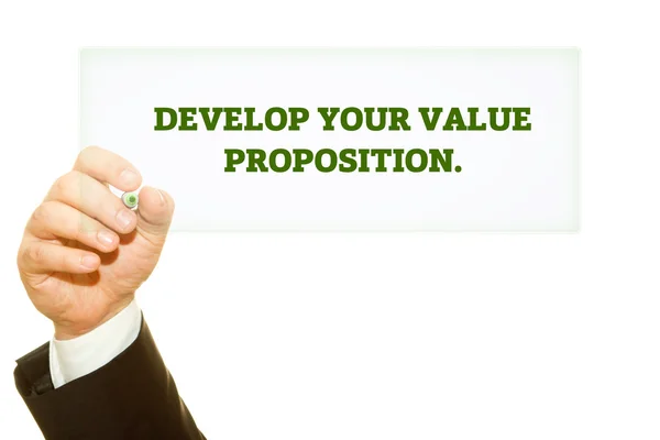 Cropped Shot Businessman Writing Develop Your Value Proposition Inscription Isolated — Stock Photo, Image