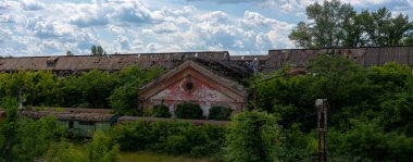 Budapest, Hungary - May 31, 2025: Panoramic shot of an abandoned train depot on the outskirts of Budapest