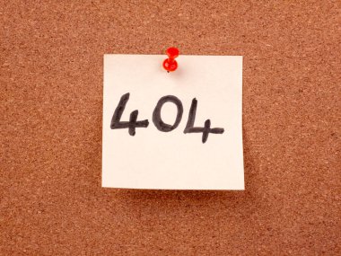 A white sticky note with the number 404 handwritten in black marker is pinned to a brown cork board with a red pushpin. This is a concept for the 'page not found' internet error.