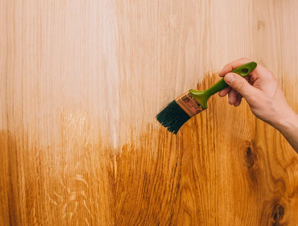 Textura de madera, mano y pincel — Foto de Stock