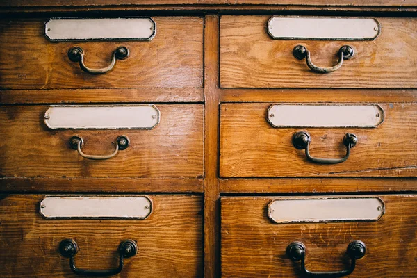 Wooden drawers with labels — Stock Photo, Image