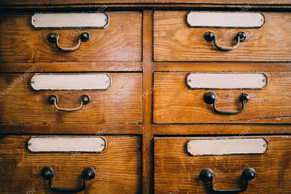 Wooden drawers with labels Stock Photo by ©Amvorsuf 111773580