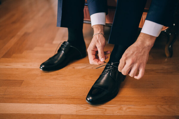 Groom wearing shoes
