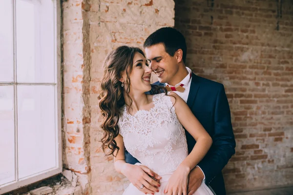 Married couple by the window — Stock Photo, Image