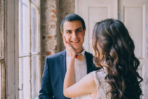 Married couple by the window — Stock Photo, Image