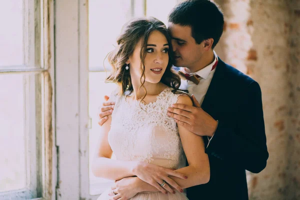 Married couple by the window — Stock Photo, Image