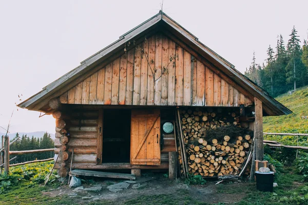 stock image Authentic wooden house in mountains