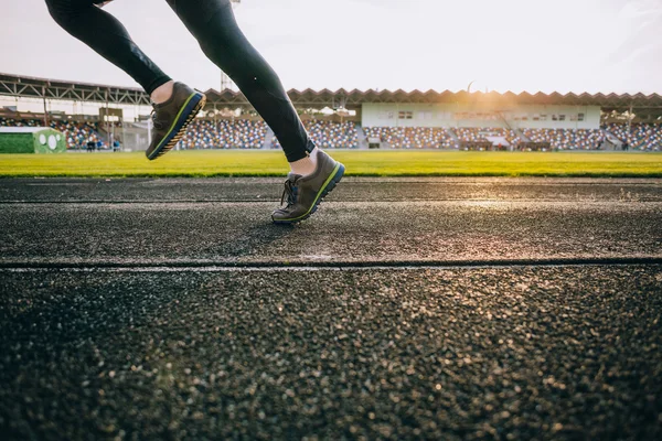 Runner legs on track — Stock Photo, Image