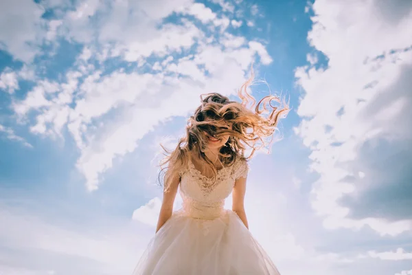 Bride over blue sky — Stock Photo, Image