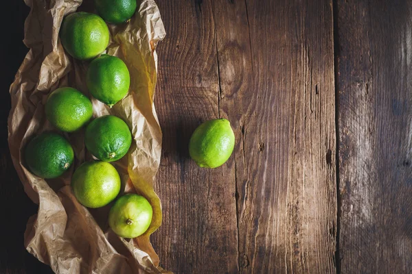 Groene citroenen groep — Stockfoto