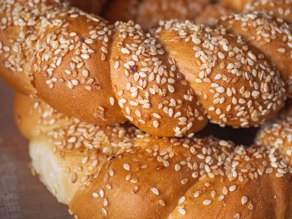 Sweet sweet rolls with sesame seeds for morning breakfast