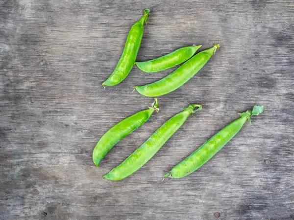 Vainas Guisantes Verdes Jóvenes Una Vista Superior Mesa Calle — Foto de Stock