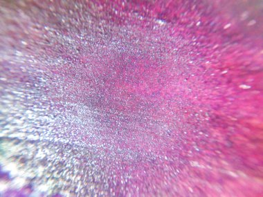 Soyut pembe-mor parlak arka plan veya dokulu payetler ve