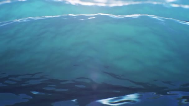 Красиво крупним планом Водні хвилі Безшовні. Повільний рух на петлі 3d Анімація плаваючої поверхні води вид спереду. 4k Ultra HD 3840x2160 . — стокове відео