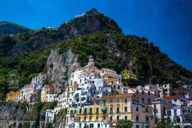 Scenic colorful old houses on hill.  clipart