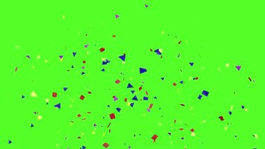 İki tüplü konfeti patlaması. Doğum günü kutlaması yeşil arka plan.