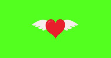 Yeşil arka planda uçan kanatlı kalp