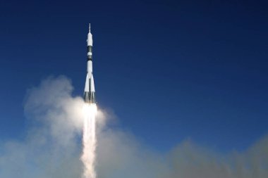 Launch of a space rocket into space. Against the background of the sky. Elements of this image were furnished by NASA. High quality photo clipart