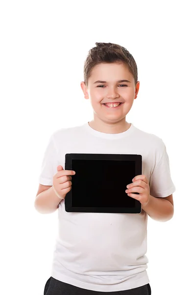 Хлопчик з планшетним комп'ютером ізольований на білому — стокове фото