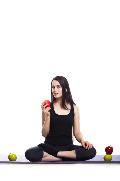 Girl is engaged in yoga on a white background, Stock Photo