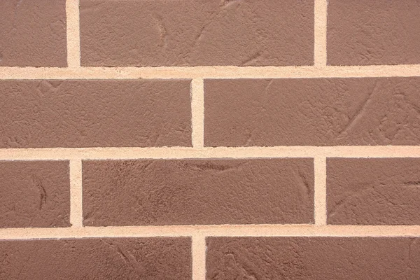 Tegel vägg i en nära — Stockfoto