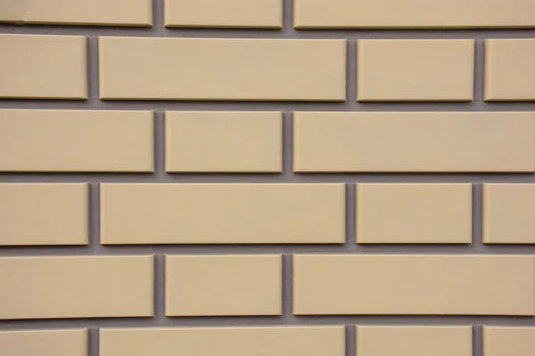 Parede de tijolo em um close-up — Fotografia de Stock